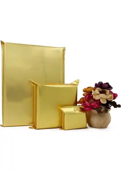 Repro Design 30x45 Gold Lüks Poşet ve Tuğset Yılbaşı Pelur Kağıdı Karşılaştırması