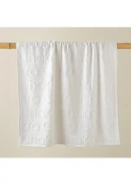 Chakra Logolu Beyaz Plaj Havlusu: Şıklık ve Konforun Birleştiği Yüksek Kaliteli Seçenek