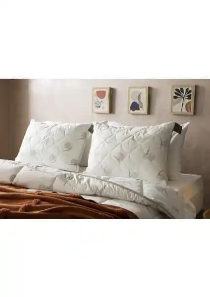 Duvetta Kapitone Kılıflı Yün Boncuk Yastık: Doğal ve Ayarlanabilir Uyku Konforu Sağlar