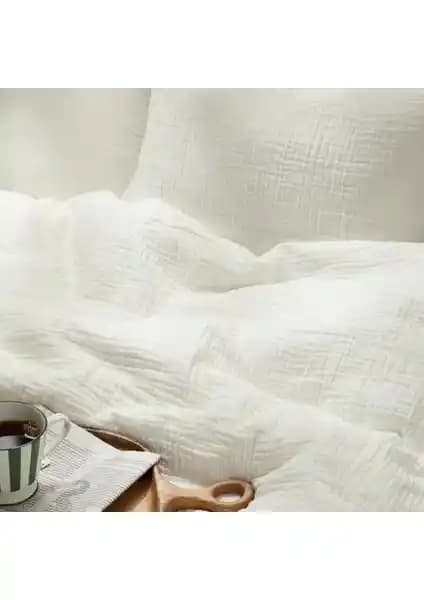 Gine Teks 4 Kat Müslin Yatak Örtüsü ve TV Battaniyesi: Sağlıklı ve Şık Kullanım Alternatifi