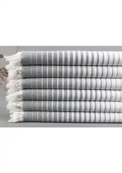 Kayra Export Beyaz ve Koyu Gri Plaj Havlusu: Çok Yönlü Kullanım ve Estetik Tasarım