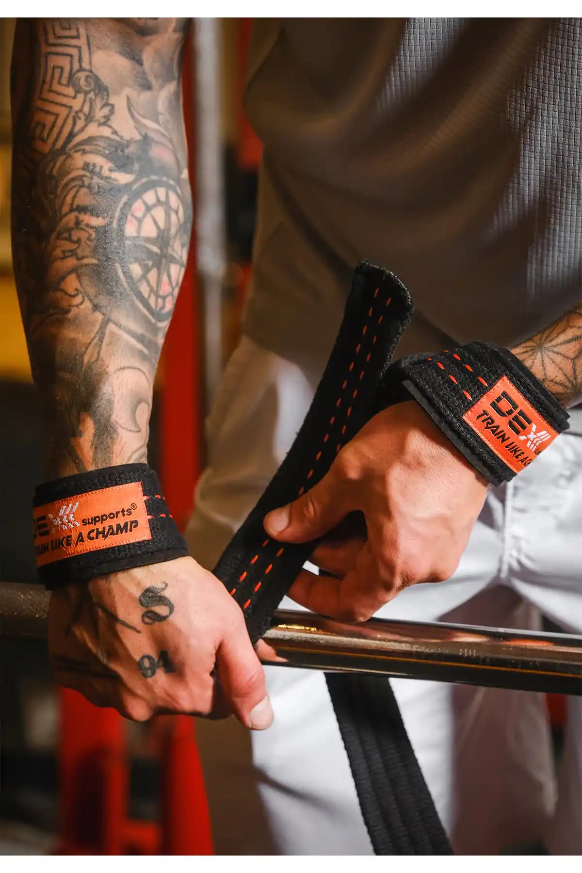 Dex Supports Siyah Turuncu Pedli Halter Kayışı Güç ve Konfor Sunan Spor Ekipmanı